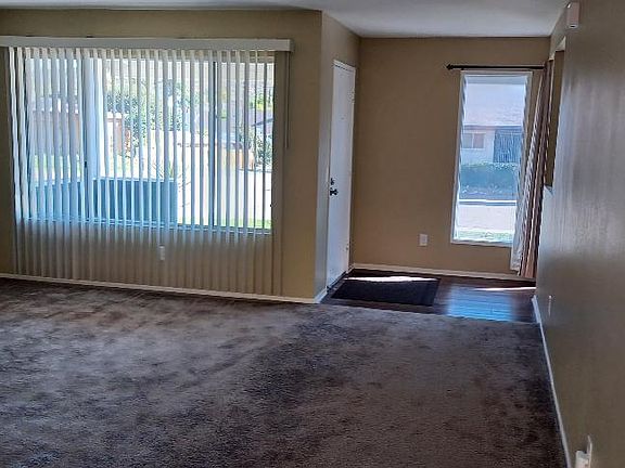 entry to living room. carpeted.