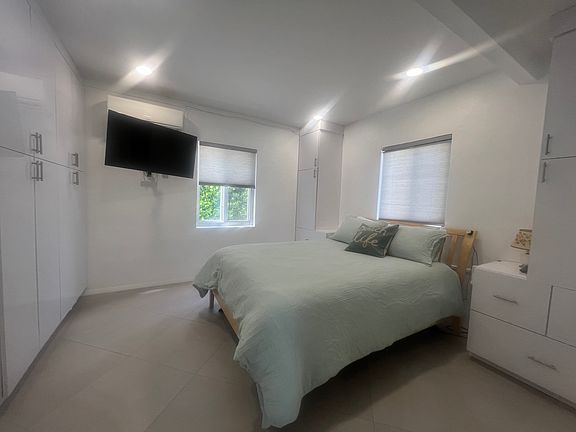 Bedroom with lots of storage/closet space.