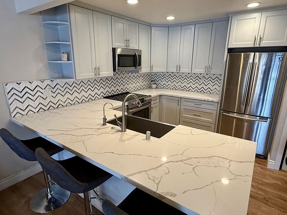 Remodeled kitchen with stainless steel appliances