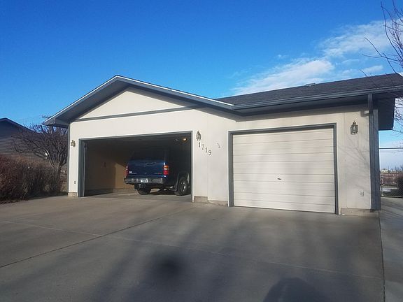Two car garage and extra 3rd stall garage. 3rd stall is heated could make a good work area also.