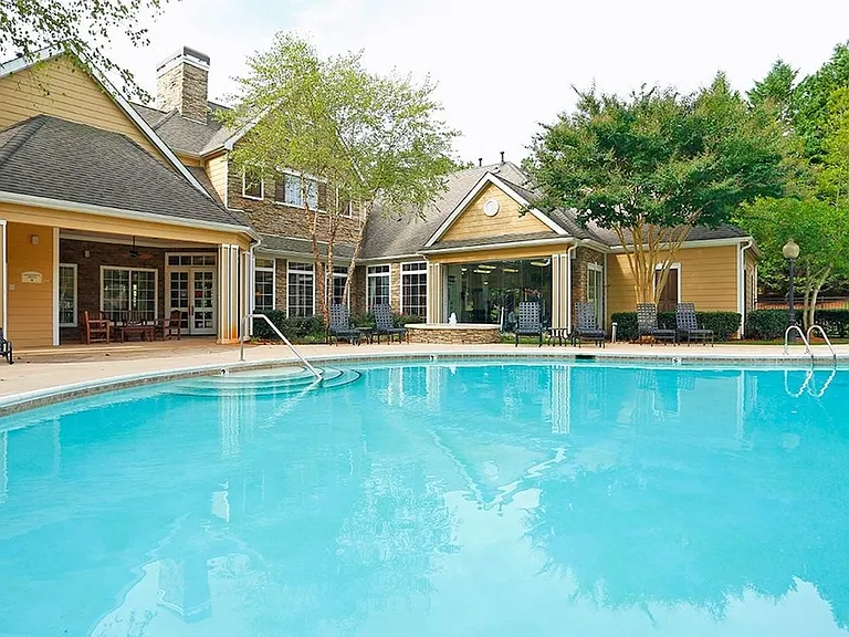Enjoy sun-kissed days by our warm apartment pool