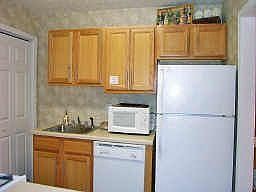 Kitchen with maple cabinets and brushed nickel hardware