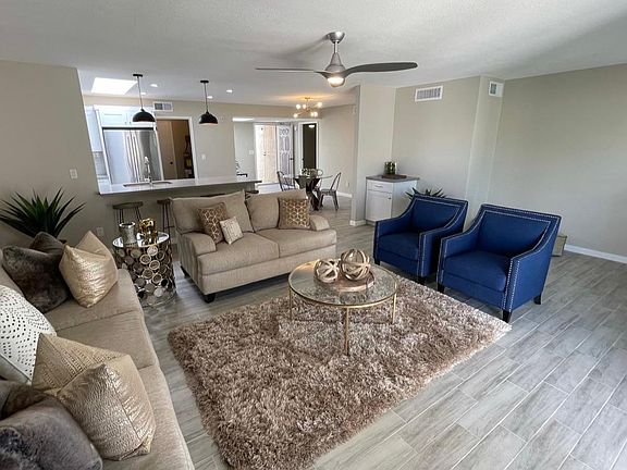 Very Open & Spacious Floor Plan with Updated, Lighting & Plumbing Fixtures, Ceiling Fans, Window Covers & Dual Pane Windows Throughout