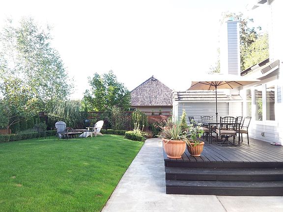 back yard with fire pit area