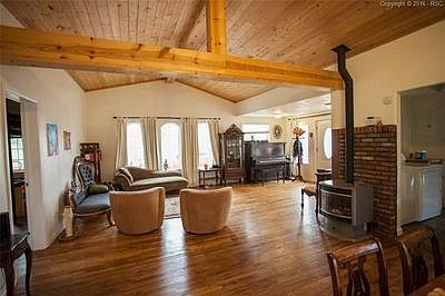 Fantastic exposed wood beam and natural wood plank celings.