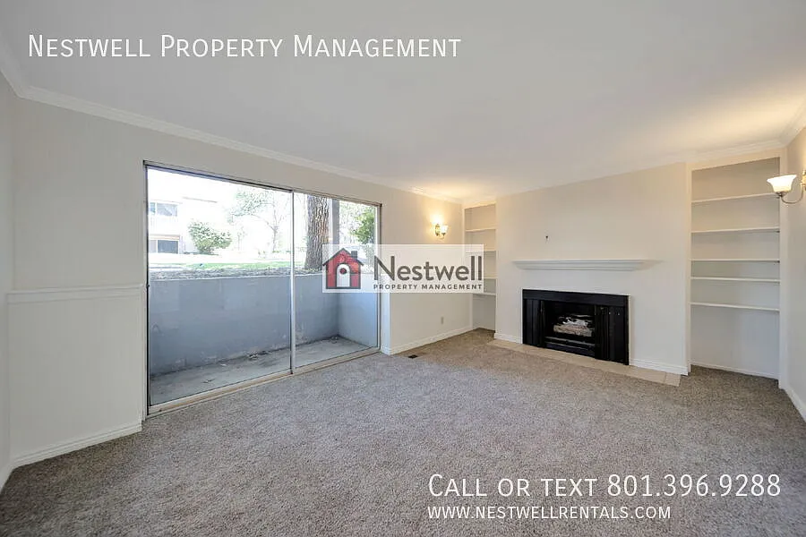 $500 off 1st Month's Rent - Charming One-Level Condo in Ideal Location — Photo 2