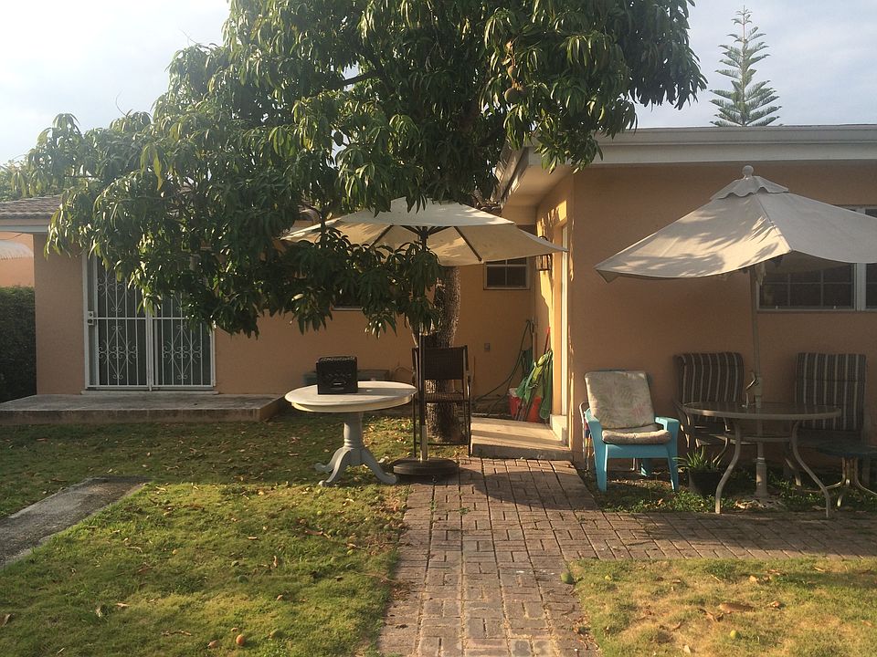 Front entrance with patio furniture