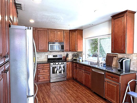 Kitchen with the window that overlooks the large side yard