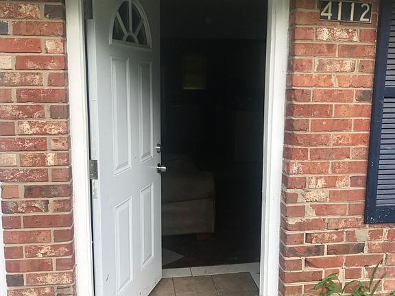 Secure front door with a tiled entrance, kitchen and hallway and hardwoods throughout!!