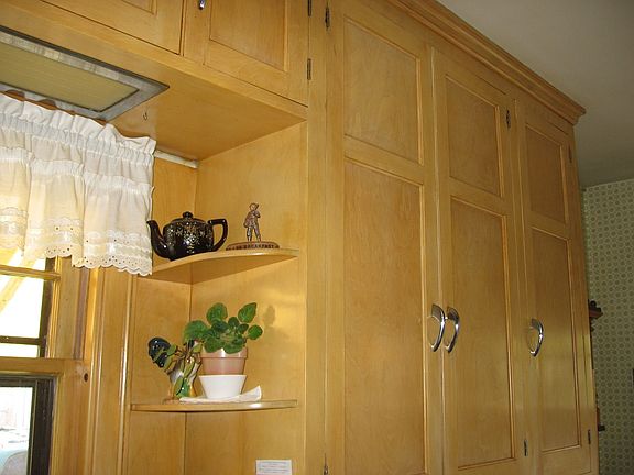 Custom Maple cabinetry throughout.