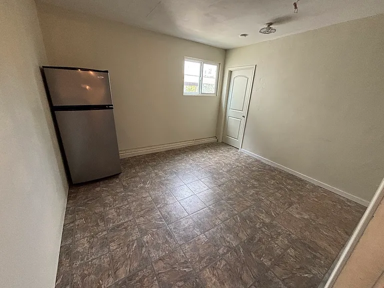 Garage converted to storage. Accesses directly from the kitchen.