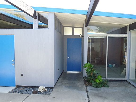 Atrium view of Front Door & Bedroom