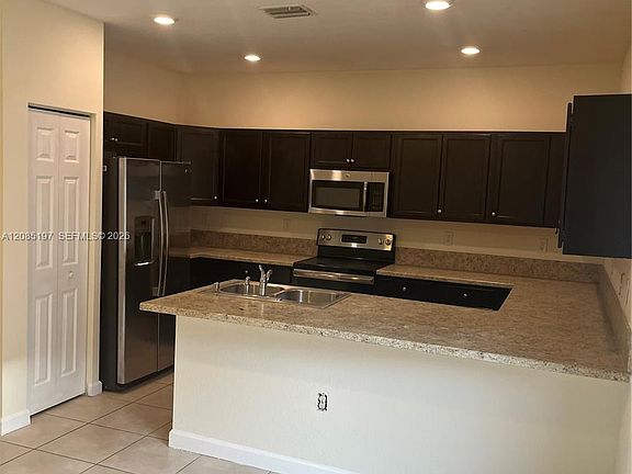 3rd image of 9373 W 33rd Way #9373