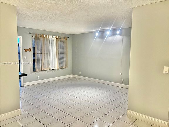 2nd image of 10002 Winding Lake Rd APT 203