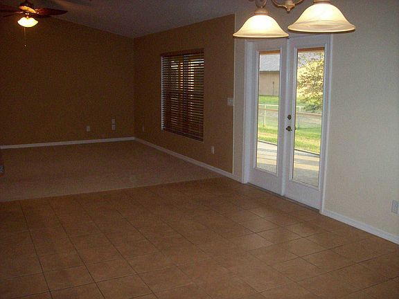 Dining room looking into living room. French Doors to 10x30 Lanai.
