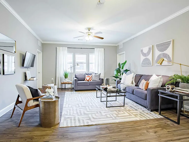 Step into this inviting living room, where modern design meets comfort.