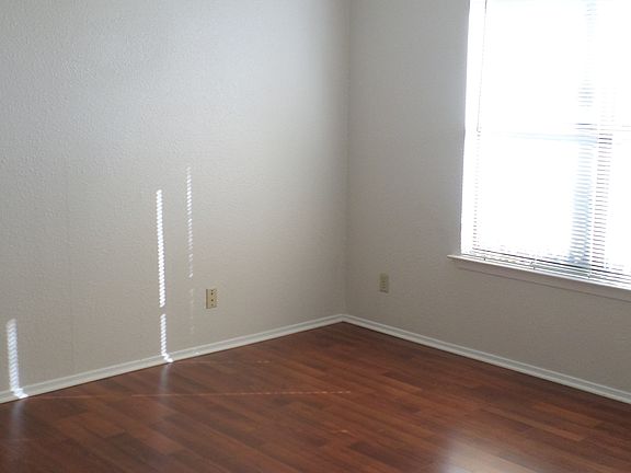 All bedrooms have laminate flooring.