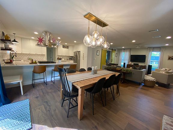 open floorpan living area, view from dining room/fireplace.