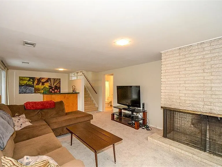 Lower level with MCM fireplace