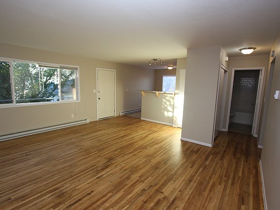 Open living room and dedicated deck for this unit only