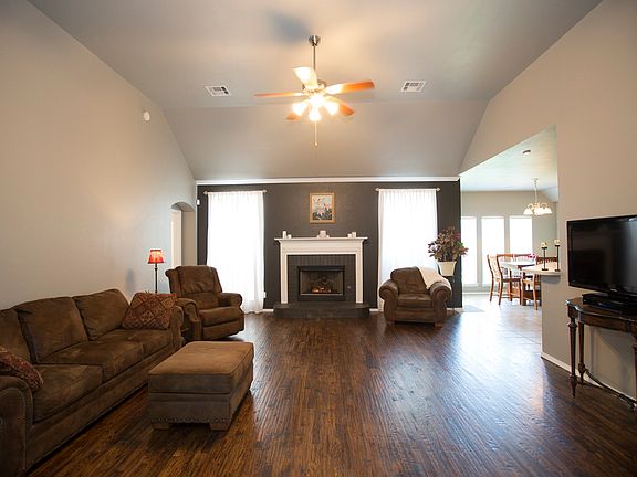 Large living with fireplace