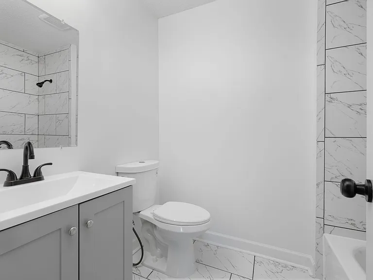 8228 Brooksville Cv — Photo 13