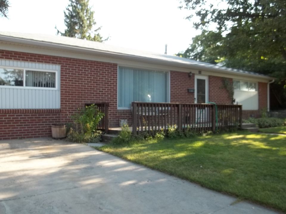 Brick Exterior w/ cozy deck