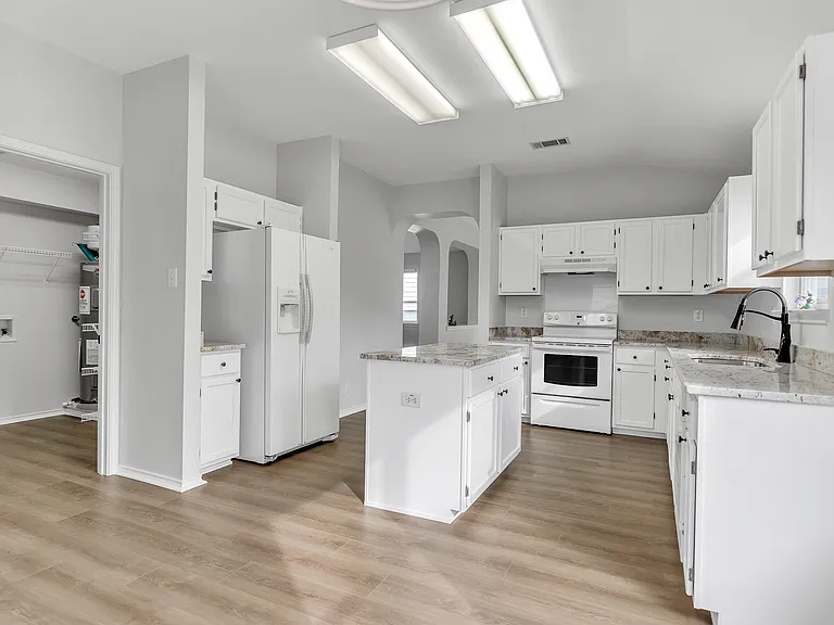 Kitchen with preview of Pantry