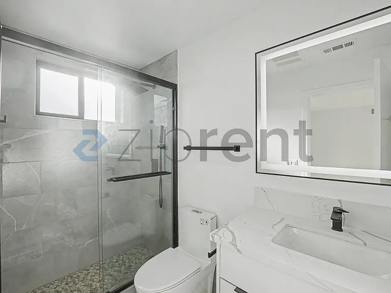 1438 W 37th Dr — Photo 18