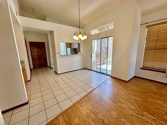 Looking at Dining area and outside covered patio number 1