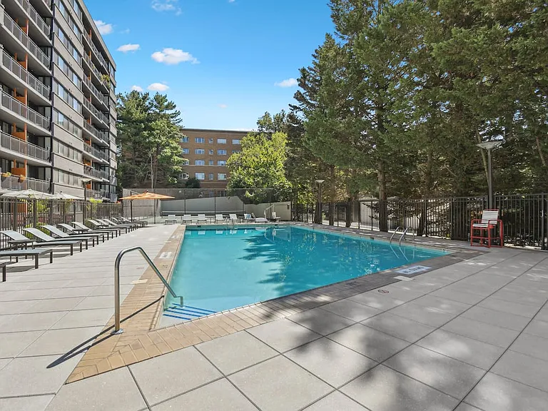 Pool and sundeck with lounge seating