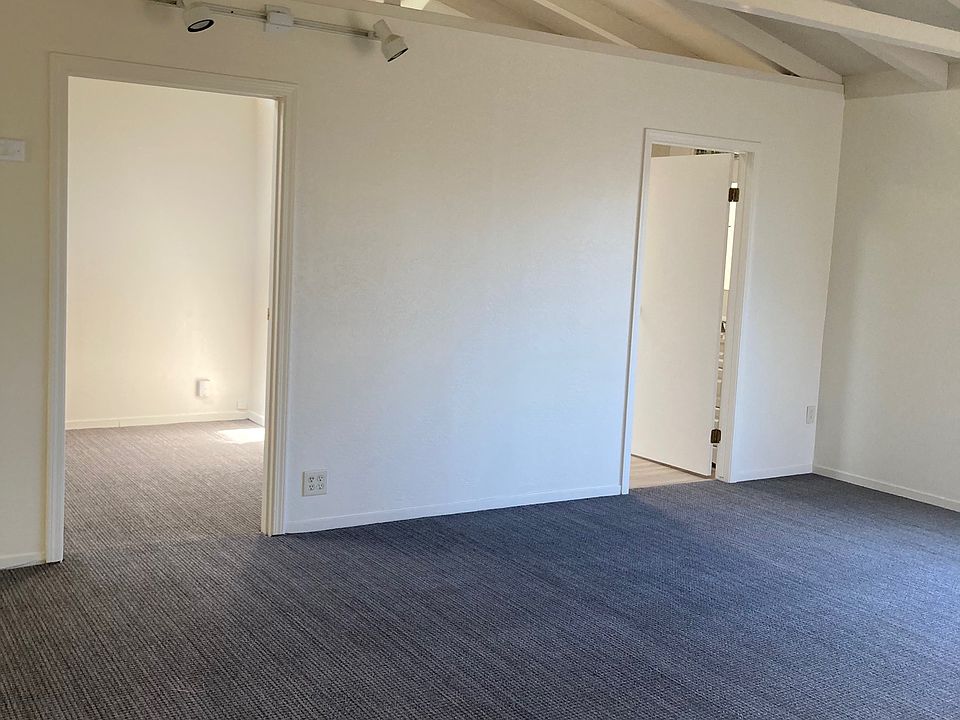 Entries to bedroom and vanity from living room