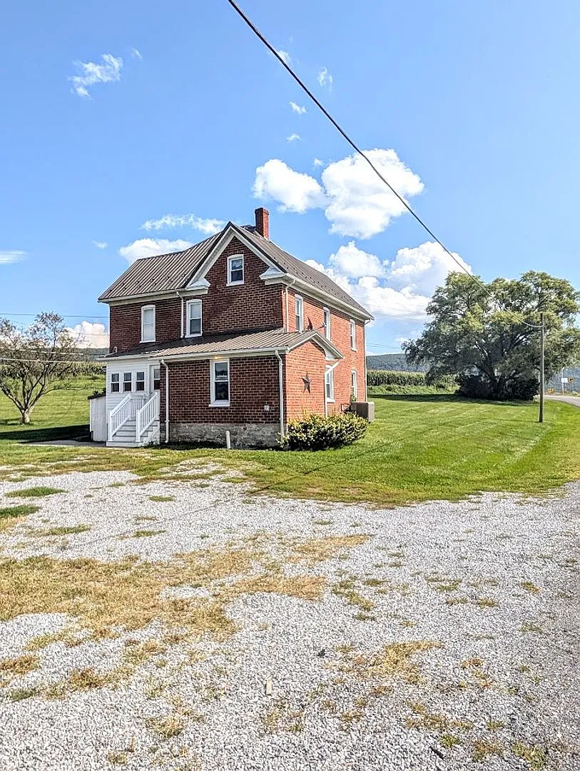 Discover comfort and country charm at 120 Birch Lane, Bedford, PA 15522. — Photo 4