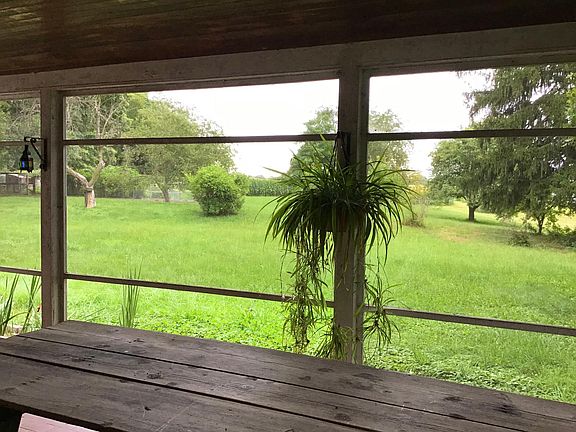 Large side yard view from porch