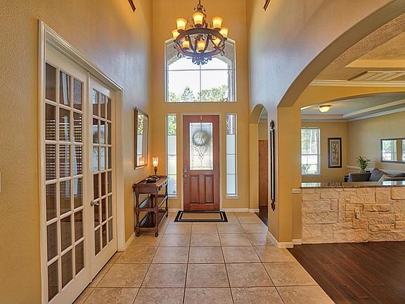 New designer chandelier in impressive two story entry!