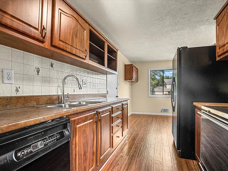 6700 Cipriano Rd — Photo 22