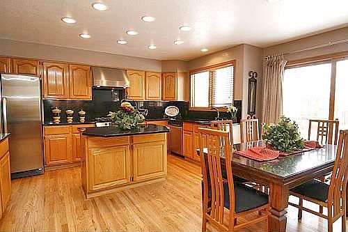 Slab granite, stainless appliances, undercounter lighting!