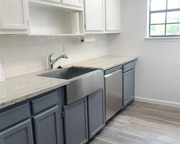 Another view of that large fabulous kitchen sink. LG dishwasher.