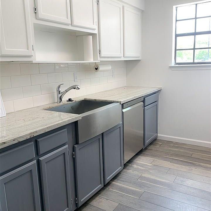 Another view of that large fabulous kitchen sink. LG dishwasher.