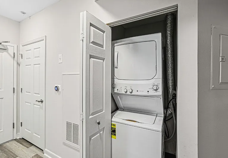 In-Unit Laundry Appliances Behind Bi-Fold Doors