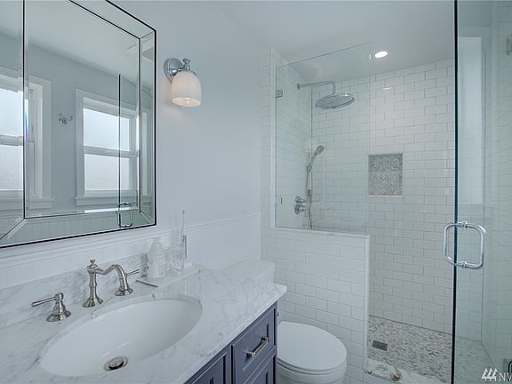 This brand new master suite bath is AMAZING!  Gorgeous subway tile and glass enclosure for the shower, new vanity, mirrored medicine cabinet, lighting and fixtures too.  It will take your breath away!