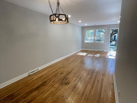 Dining and living room area view from kitchen.