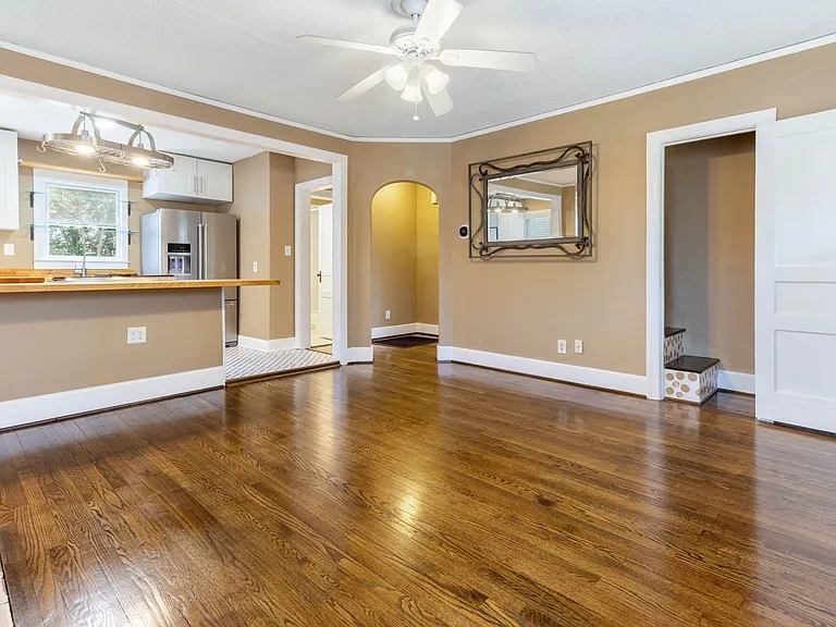 Unfurnished Main Living Space Spacious and unfurnished interior ready for personalization, with clean lines, neutral finishes, and flexible setup for furniture or resident studio equipment.
