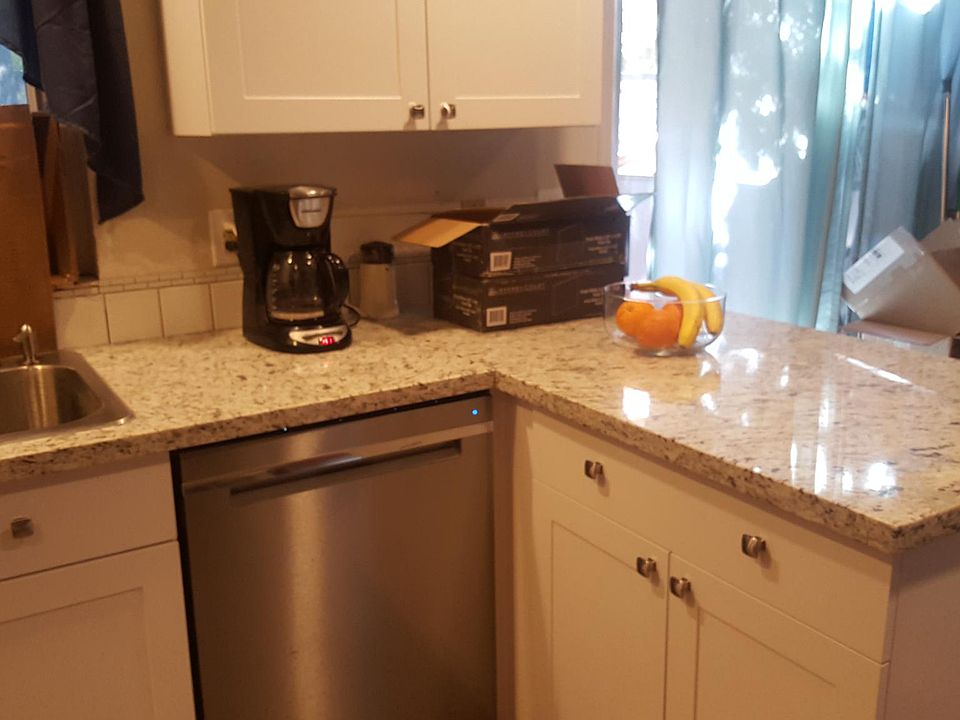 Granite countertop and soft closing drawers.