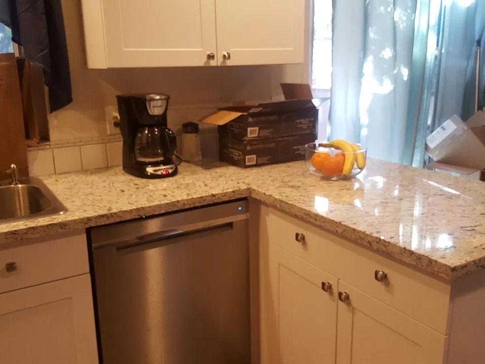 Granite countertop and soft closing drawers.