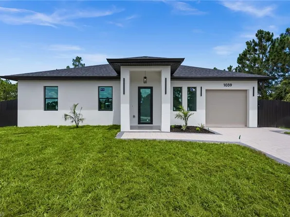 1039 Bassinger AVE S, LEHIGH ACRES, FL 33974