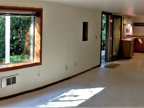 Front Door, Sunny Living Room, Kitchen, Door to Bedroom