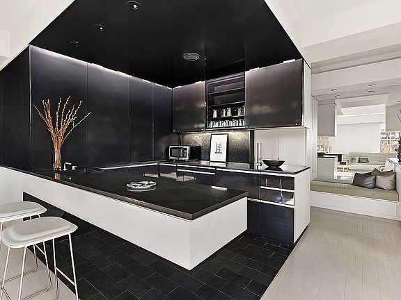 3rd image of UNIT-7EF 143rd Ave