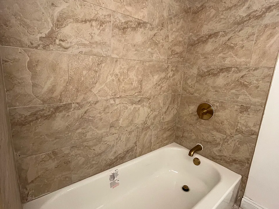 New bathroom (New bath tub, new shower head, new faucets, new tile in bathroom)