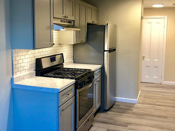 New Stainless Gas Range, Refrigerator, Under LED Lighting, New Cabinets Soft Close, New Countertop, Subway Tile